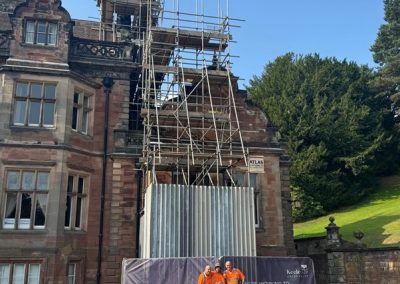 Some of the Atlas Scaffolding Limited team stood outside Keele Hall after erecting scaffolding to allow chimney repairs.