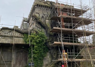 An example of Atlas Scaffolding Limited's work at Alton Towers Amusement Park around the ramparts of a castle that is incorporated into a ride.